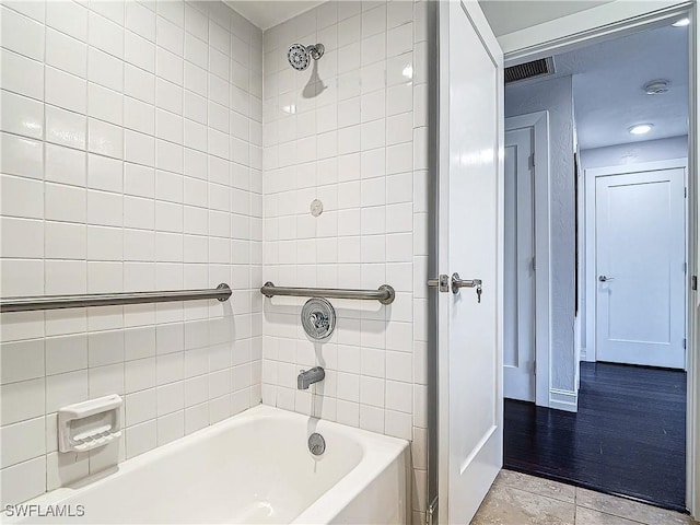 4348 Beechwood Lake Dr, Naples, FL 34112 - bathroom with tiled shower / bath combo and tile patterned flooring