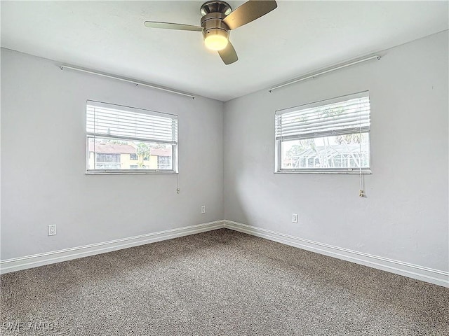 4348 Beechwood Lake Dr, Naples, FL 34112 - empty room with a wealth of natural light and ceiling fan