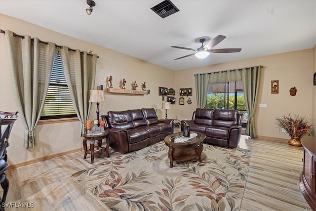 3014 SW 9th Pl, Cape Coral, FL 33914 - living room with baseboards, ceiling fan, and wood finished floors