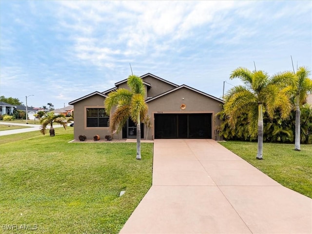 ranch-style home featuring a garage and a front lawn