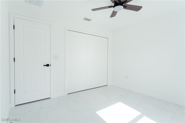 unfurnished bedroom with ceiling fan