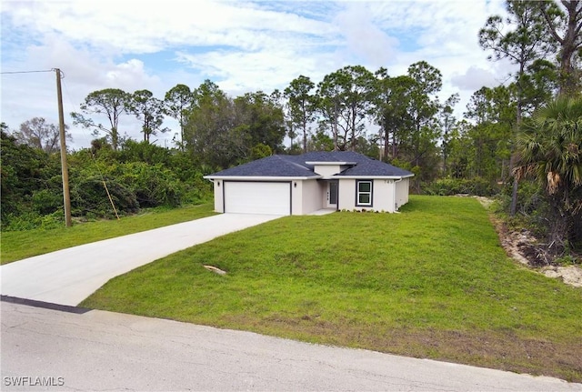 view of front facade featuring a front lawn and a garage