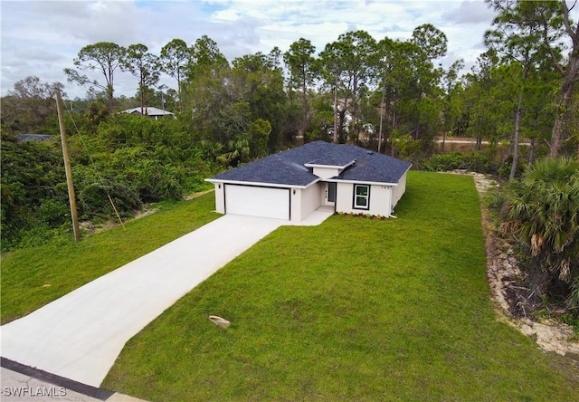 ranch-style house with a front lawn and a garage