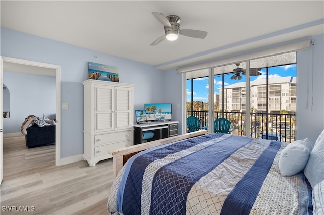 bedroom featuring access to outside, ceiling fan, and light wood-type flooring