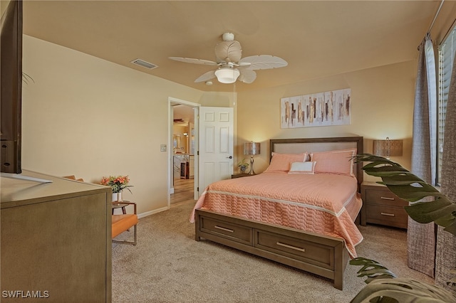 bedroom with light carpet and ceiling fan