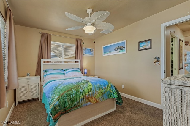 bedroom with ceiling fan and carpet floors