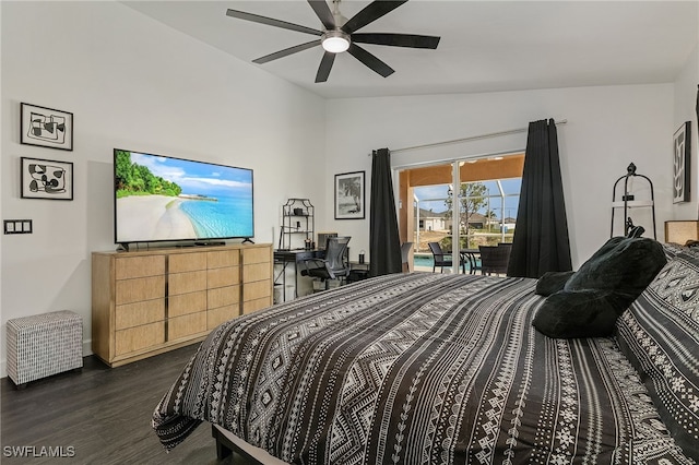 bedroom featuring ceiling fan, dark hardwood / wood-style flooring, lofted ceiling, and access to outside