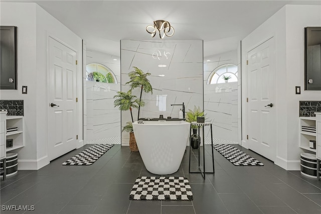 tiled entrance foyer with tile walls