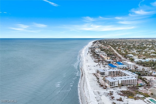 aerial view featuring a view of the beach and a water view