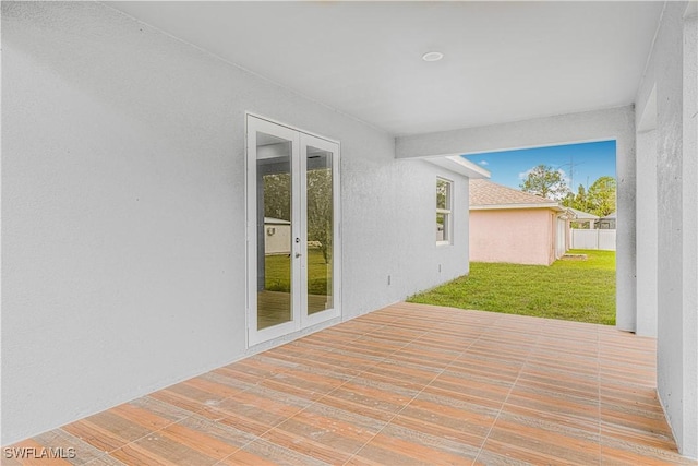 interior space featuring french doors and a yard