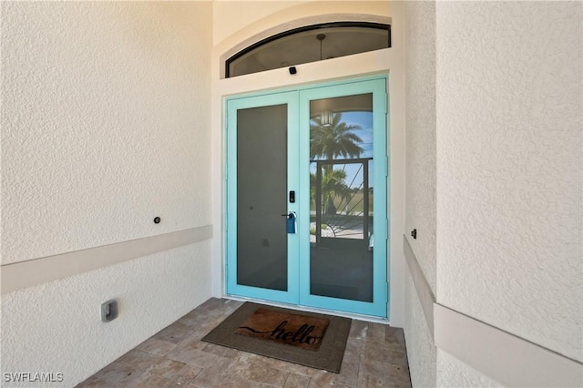 view of exterior entry with french doors