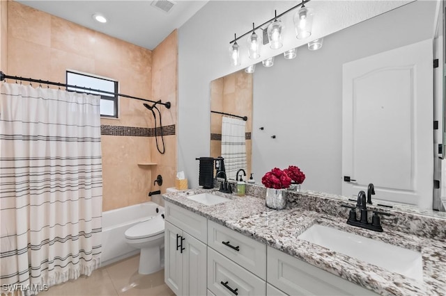 full bathroom featuring shower / tub combo with curtain, vanity, toilet, and tile patterned flooring