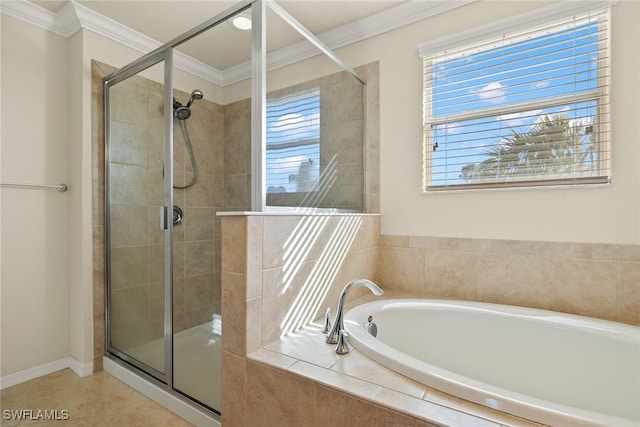 full bathroom featuring a stall shower, tile patterned flooring, a garden tub, and crown molding