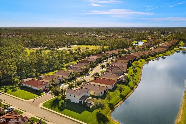 bird's eye view featuring a residential view and a water view