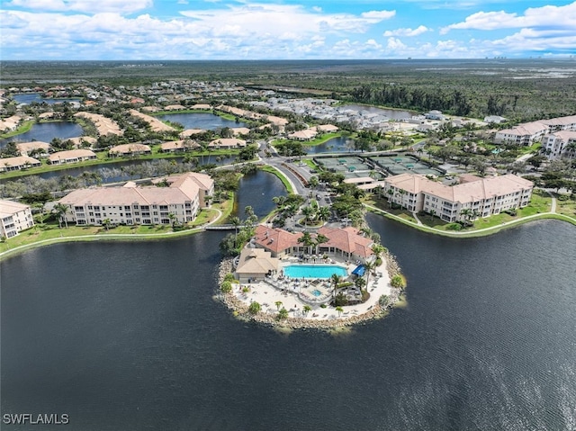 birds eye view of property featuring a water view