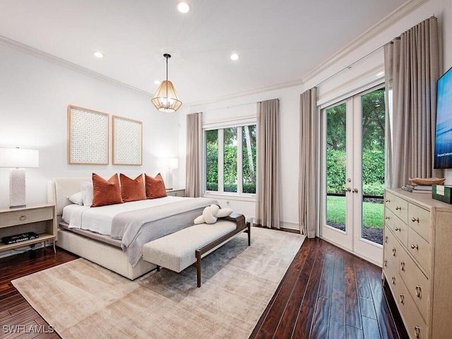 bedroom featuring dark wood-type flooring, access to exterior, french doors, and crown molding