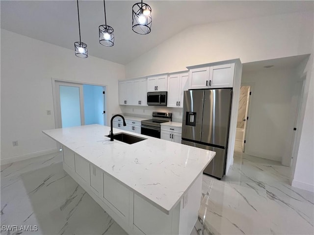 kitchen with appliances with stainless steel finishes, white cabinetry, hanging light fixtures, a kitchen island with sink, and sink