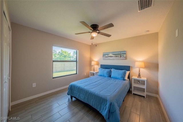 bedroom with a closet and ceiling fan