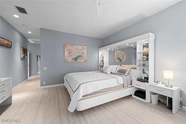 bedroom featuring light hardwood / wood-style floors