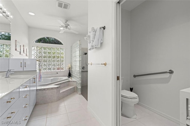 full bathroom with toilet, separate shower and tub, tile patterned floors, and plenty of natural light