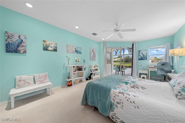 bedroom with ceiling fan, access to exterior, and carpet flooring