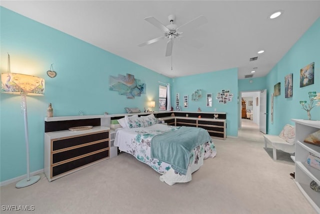 carpeted bedroom with ceiling fan