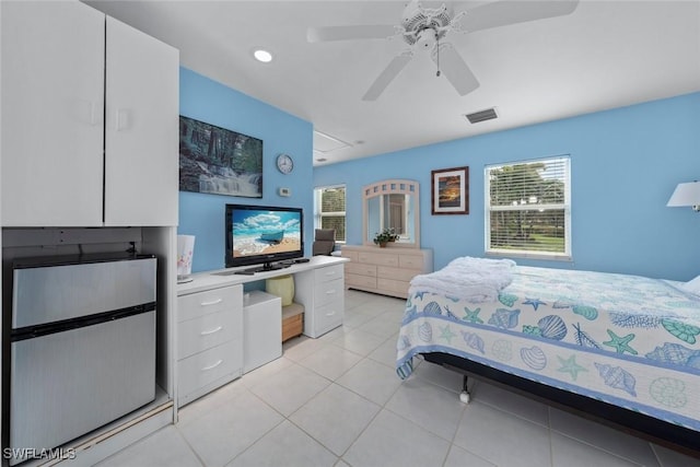 bedroom featuring ceiling fan and light tile patterned flooring