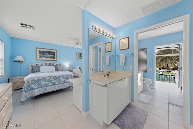 bedroom featuring ceiling fan, light tile patterned floors, access to outside, and multiple windows