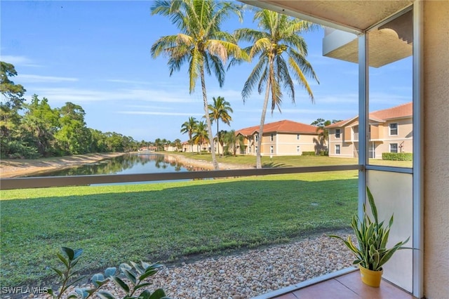 view of yard with a water view