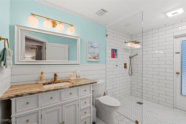 bathroom with vanity, toilet, and an enclosed shower