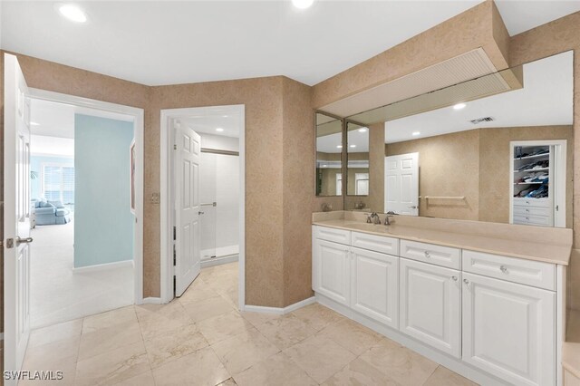 9811 Gulf Shore Dr Unit 301, Naples, FL 34108 - bathroom featuring vanity and recessed lighting