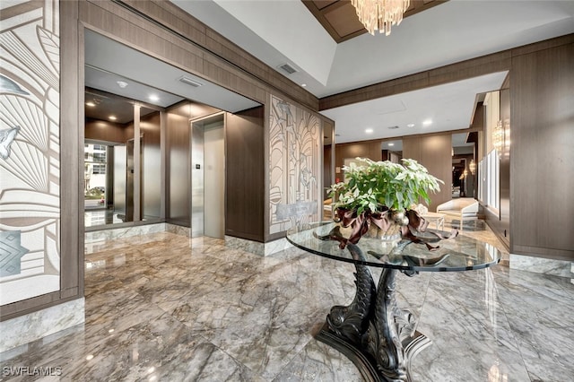 9811 Gulf Shore Dr Unit 301, Naples, FL 34108 - hall with marble tiled floors and a chandelier