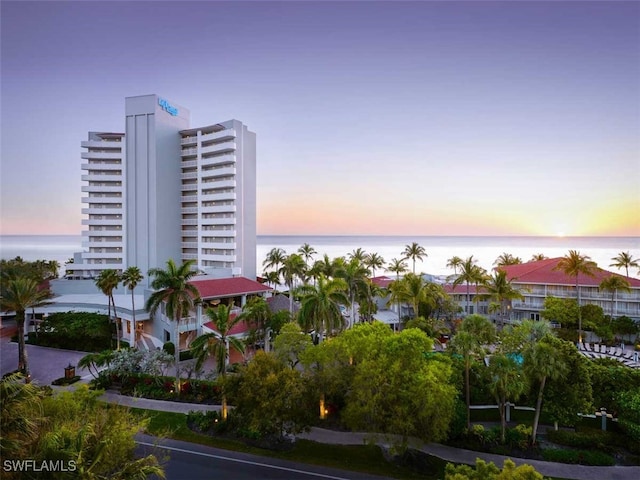 9811 Gulf Shore Dr Unit 301, Naples, FL 34108 - property at dusk featuring a water view
