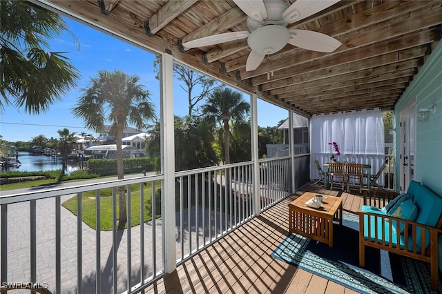 751 Glendale Ave, Naples, FL 34110 - sunroom / solarium with a water view, ceiling fan, and beamed ceiling