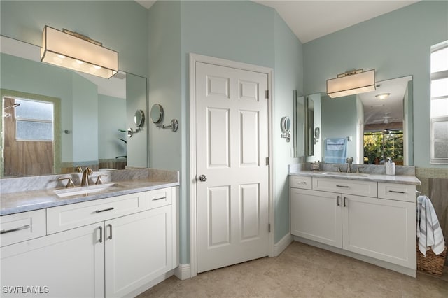 bathroom featuring vanity and tile patterned flooring