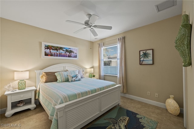 bedroom with light tile patterned floors and ceiling fan