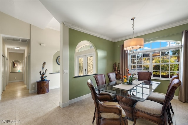 tiled dining area with crown molding