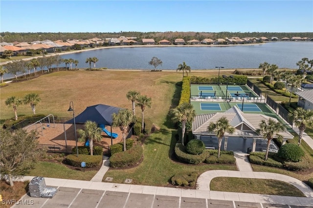 bird's eye view with a water view