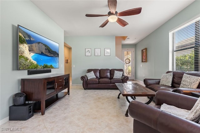 living room featuring ceiling fan