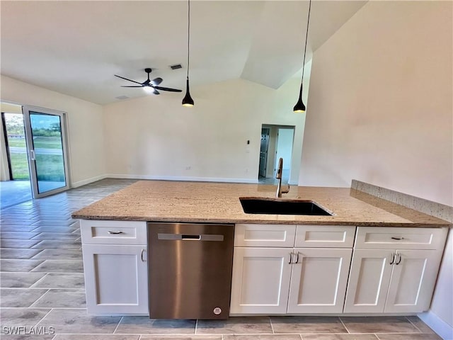 kitchen with sink, white cabinetry, decorative light fixtures, dishwasher, and light stone countertops