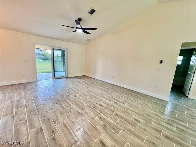 unfurnished room with vaulted ceiling, light hardwood / wood-style floors, and ceiling fan