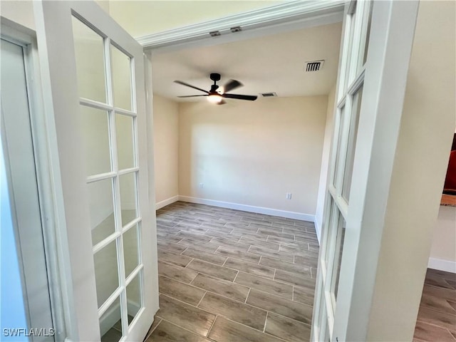 unfurnished room featuring ceiling fan