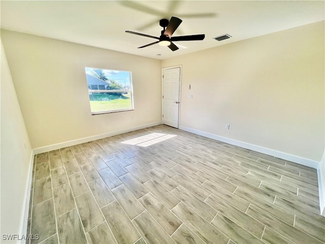 unfurnished room with ceiling fan