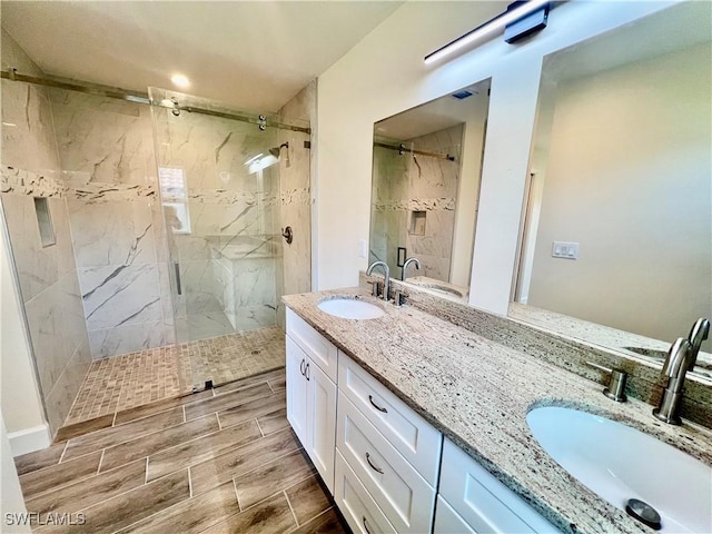 bathroom featuring vanity and walk in shower