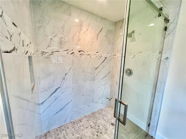 bathroom featuring walk in shower