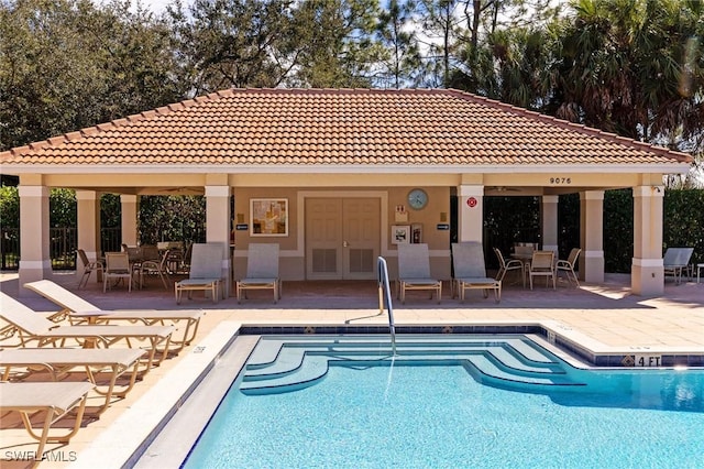 view of swimming pool featuring a gazebo and a patio area