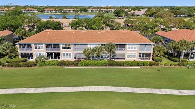 drone / aerial view featuring a water view