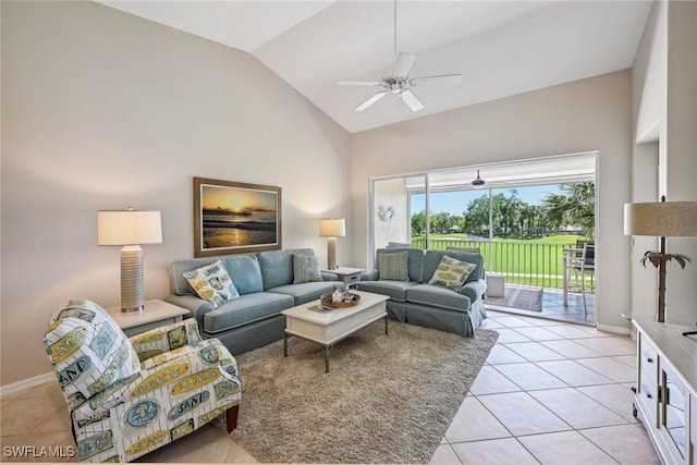 living room featuring light tile patterned flooring, high vaulted ceiling, and ceiling fan