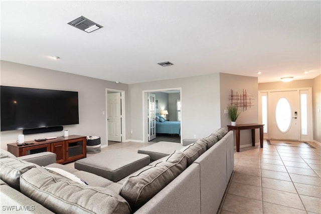 living room featuring light tile patterned floors