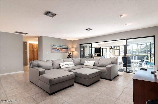 living room featuring light tile patterned floors